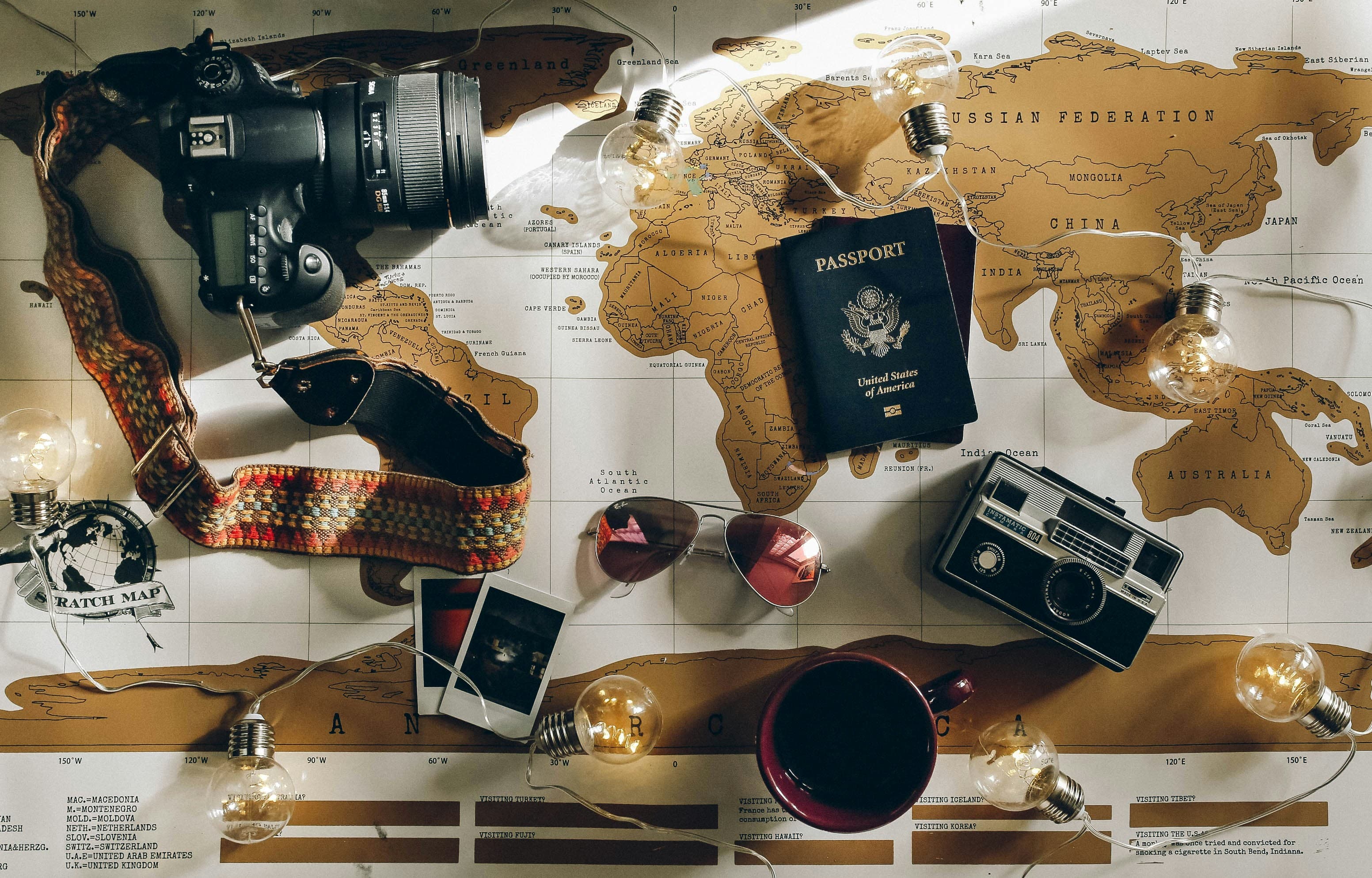 Travel planning with passport and world map